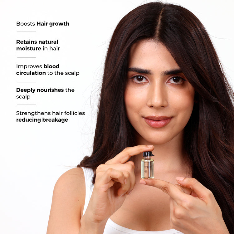 A model holding Brillare Rosemary Oil Shots with side text include its benefits: boosts hair growth. retains natural moisture in hair. improves blood circulation to the scalp. deeply nourishes the scalp. strengthens hair follicles reducing breakage.