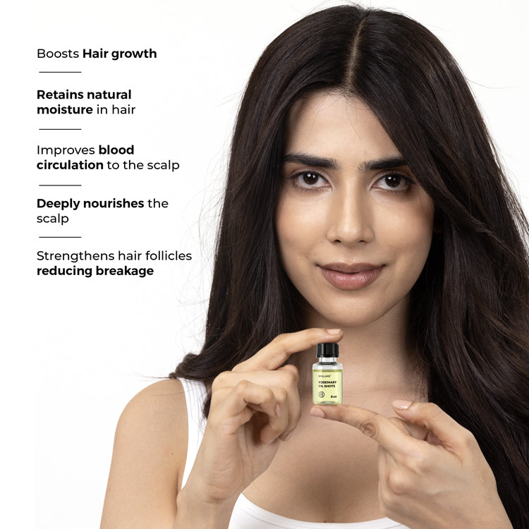 A model holding Brillare Rosemary Oil Shots with side text include its benefits: boosts hair growth. retains natural moisture in hair. improves blood circulation to the scalp. deeply nourishes the scalp. strengthens hair follicles reducing breakage.